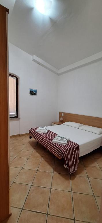 Postel nebo postele na pokoji v ubytování Nurache