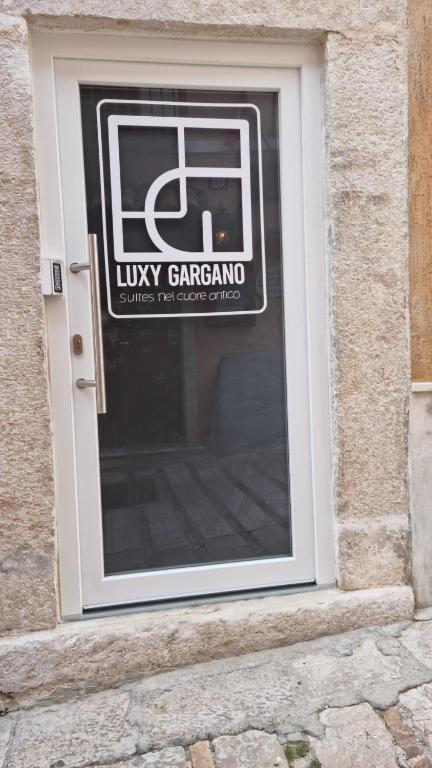 Certifikát, hodnocení, plakát nebo jiný dokument vystavený v ubytování Luxy Gargano Suite
