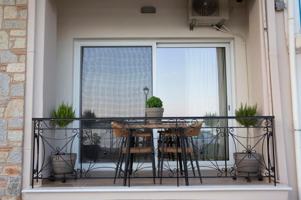 Balkón nebo terasa v ubytování Nerissa Seafront apartment
