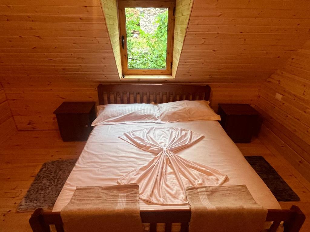 Postel nebo postele na pokoji v ubytování Te Oli Theth