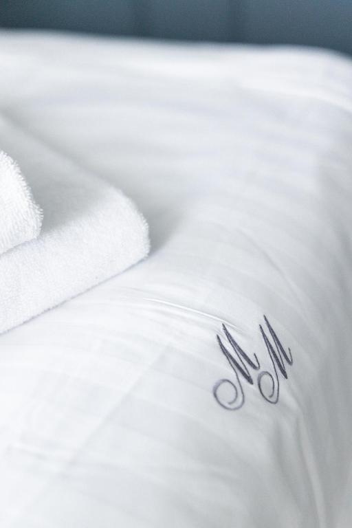 Posteľ alebo postele v izbe v ubytovaní Hotel Mały Młyn