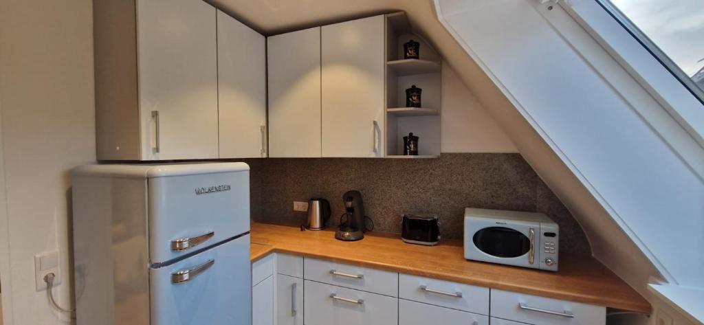 Kuchyň nebo kuchyňský kout v ubytování Renatas Ferienwohnung ISABEL