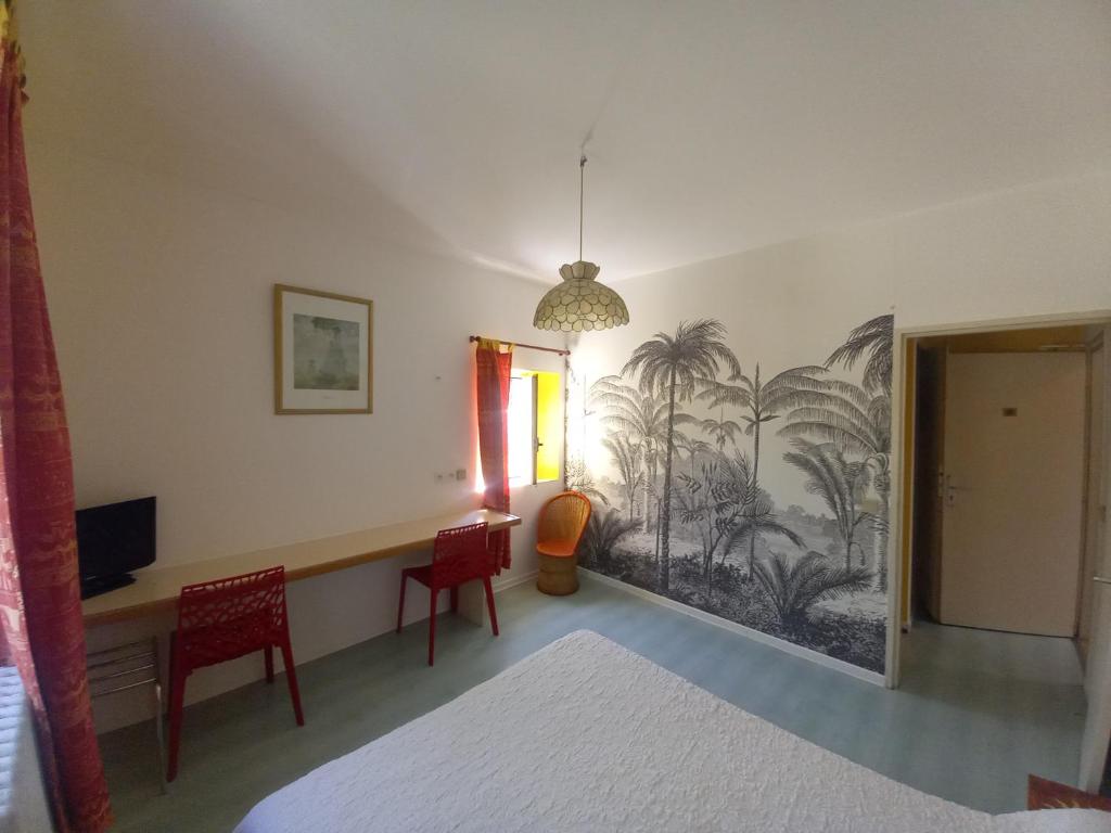 Postel nebo postele na pokoji v ubytování Hotel Acapulco