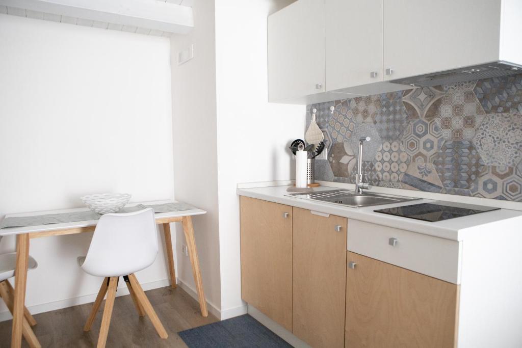 A kitchen or kitchenette at CASA MAIOLICA