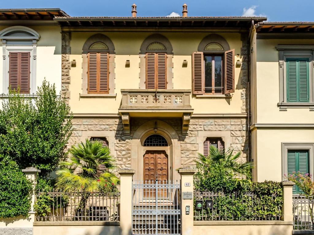 a house with a gate in front of it at Sangaggio House B&B in Florence