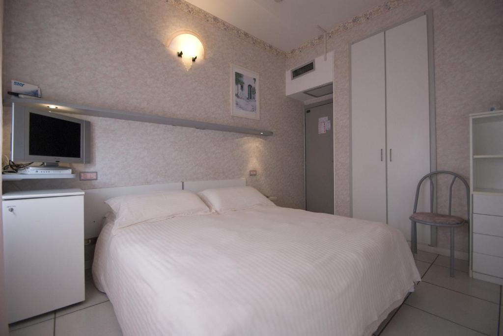 Postel nebo postele na pokoji v ubytování Marittima Rooms