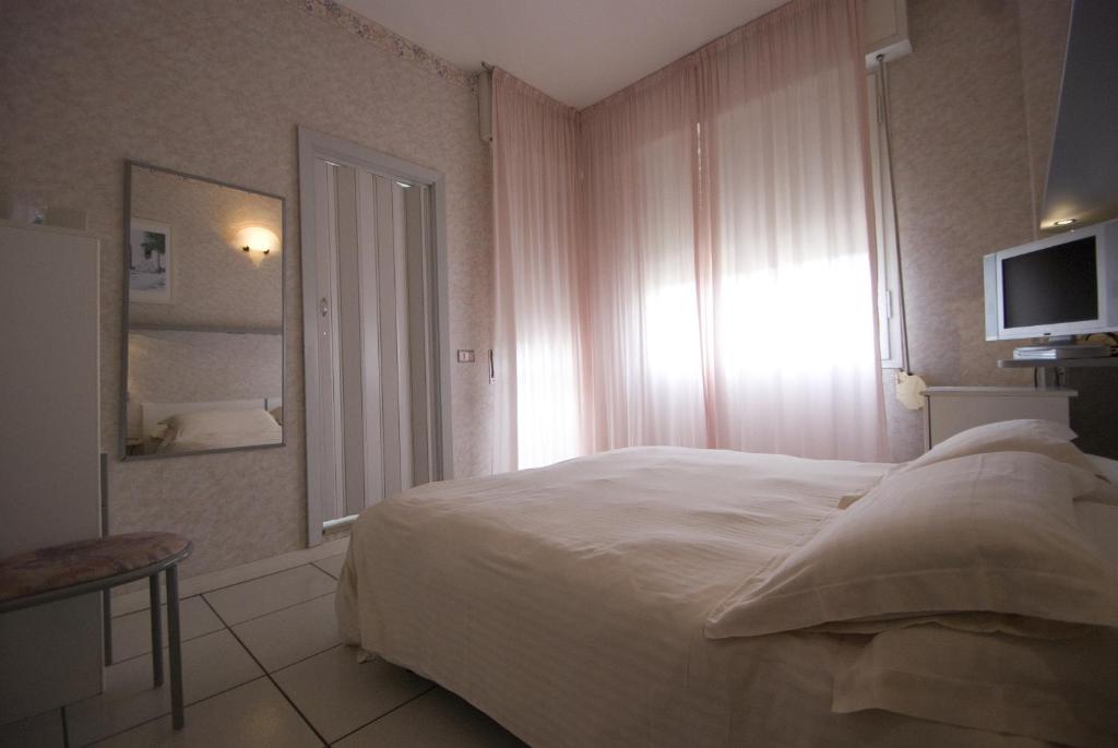 Postel nebo postele na pokoji v ubytování Marittima Rooms