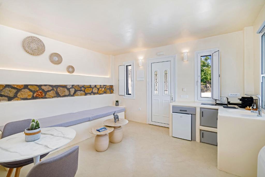 Kuchyň nebo kuchyňský kout v ubytování Eolithos Exclusive Suites