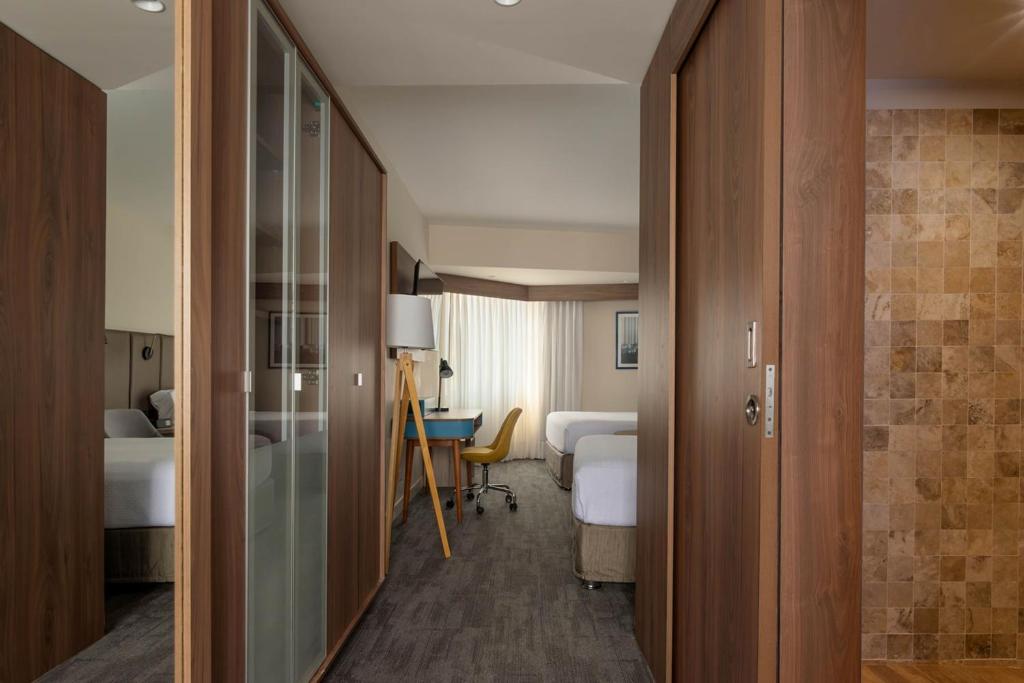 Voodi või voodid majutusasutuse Crowne Plaza Lima by IHG toas