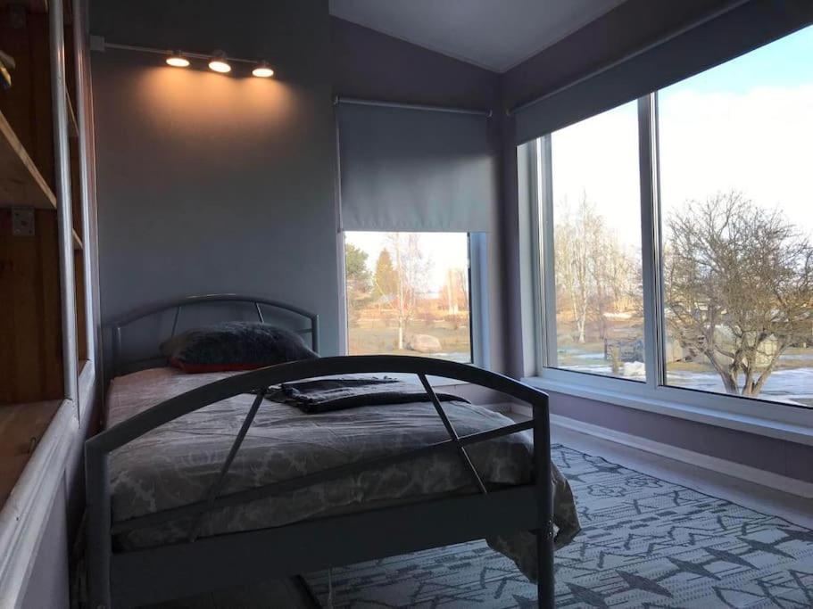 Postel nebo postele na pokoji v ubytování Aeru residence