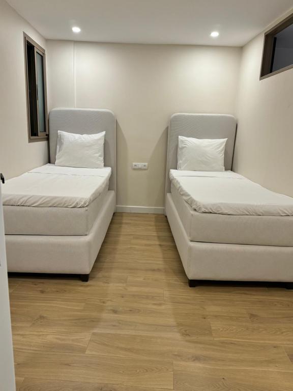 Postel nebo postele na pokoji v ubytování belle vue appartement al hoceima
