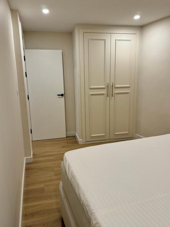 Postel nebo postele na pokoji v ubytování belle vue appartement al hoceima