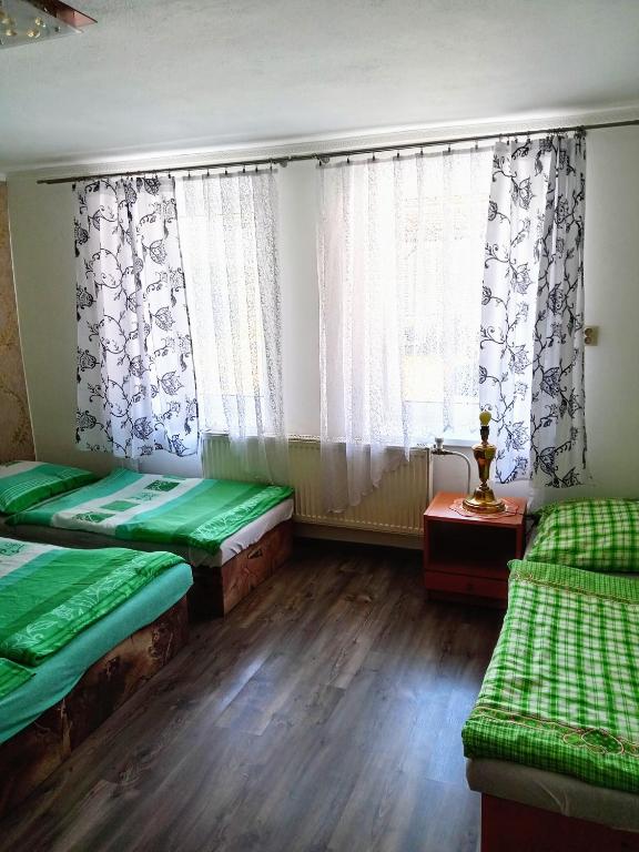 Postel nebo postele na pokoji v ubytování Apartmany a Chata Agy