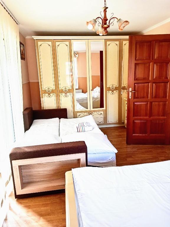 Postel nebo postele na pokoji v ubytování Apartmany a Chata Agy