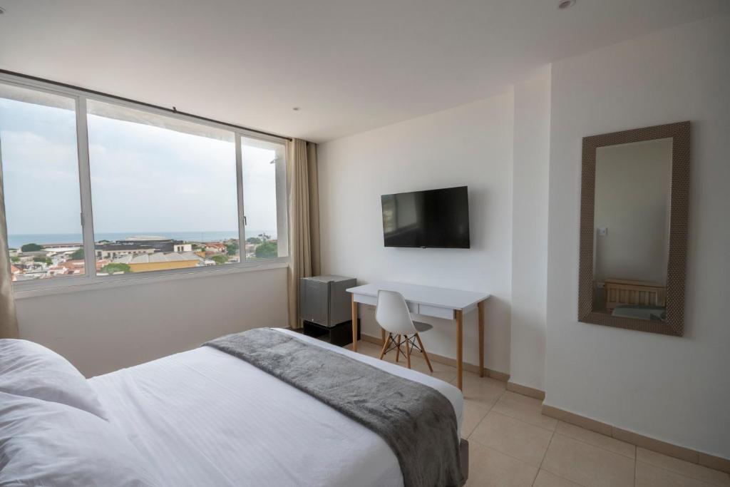 TV a/nebo společenská místnost v ubytování Hotel Stil Cartagena