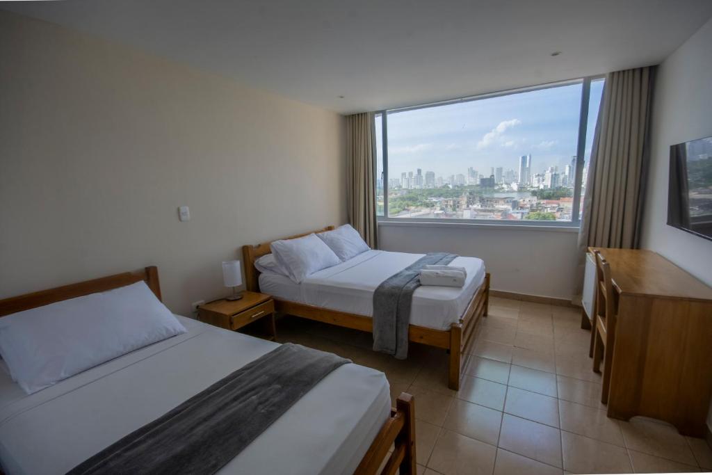 Postel nebo postele na pokoji v ubytování Hotel Stil Cartagena