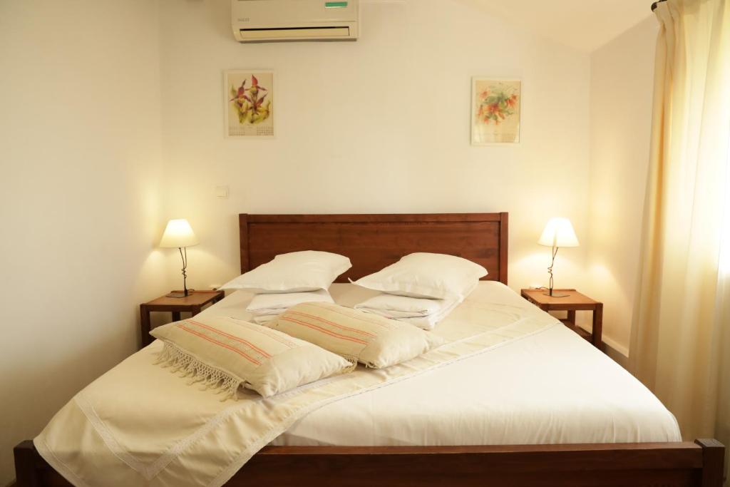 Postel nebo postele na pokoji v ubytování Casa Colinelor