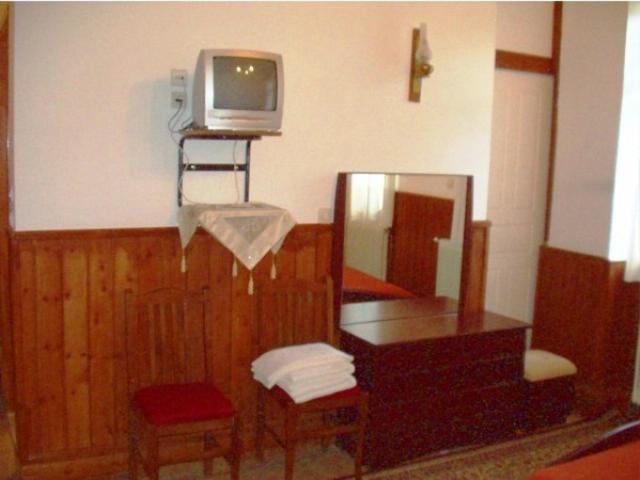 TV a/nebo společenská místnost v ubytování Hotel Papigo AE