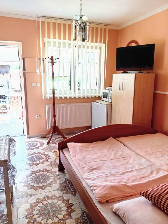 Postel nebo postele na pokoji v ubytování Apartmany a Chata Agy