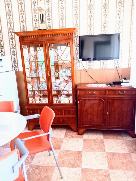 TV a/nebo společenská místnost v ubytování Apartmany a Chata Agy