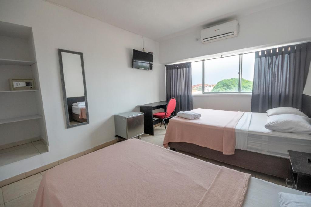 Postel nebo postele na pokoji v ubytování Hotel Stil Cartagena