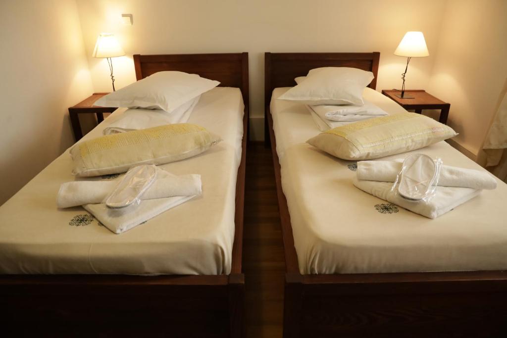 Postel nebo postele na pokoji v ubytování Casa Colinelor