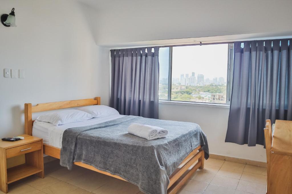 Postel nebo postele na pokoji v ubytování Hotel Stil Cartagena