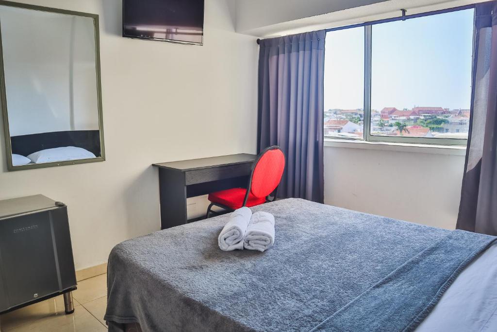 Postel nebo postele na pokoji v ubytování Hotel Stil Cartagena