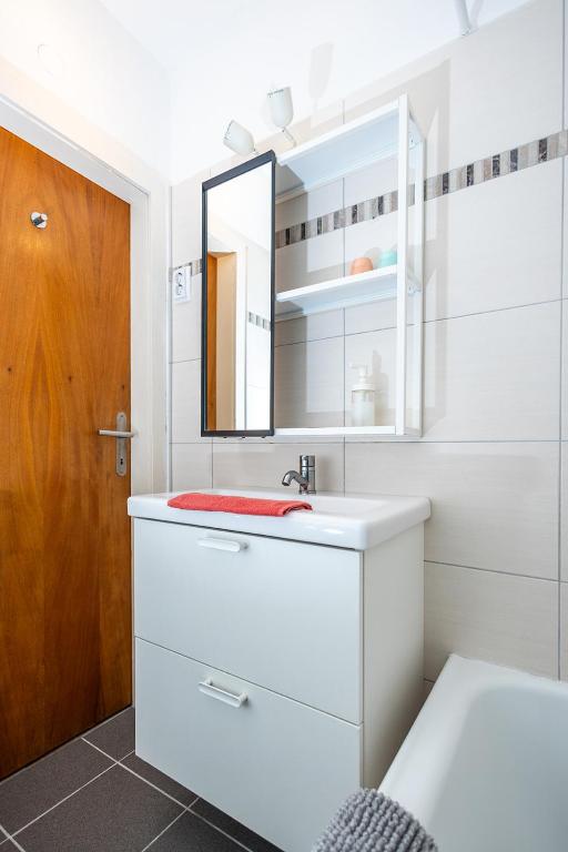 Koupelna v ubytování MOOKI Beach Apartment