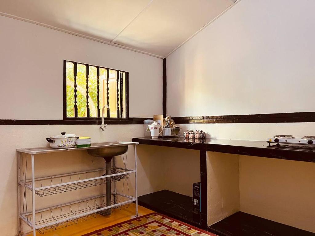 Kuchyň nebo kuchyňský kout v ubytování Inap Desa R'Sawit Pintu A