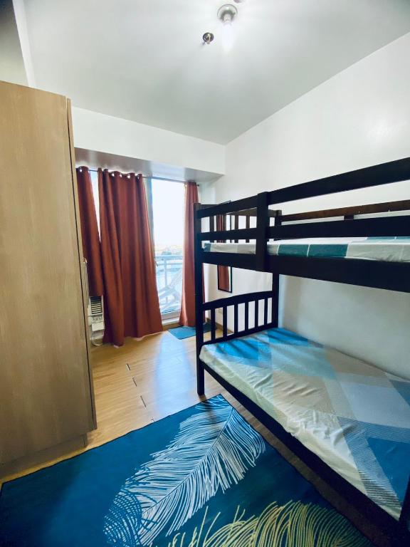 Photo from Azure Affordable Staycation near NAIA Terminal in Azure Urban Residences, KM 16, W Service Rd, Parañaque,  Metro Manila Positano tower, Paranaque,  Manila, Luzon, Philippines