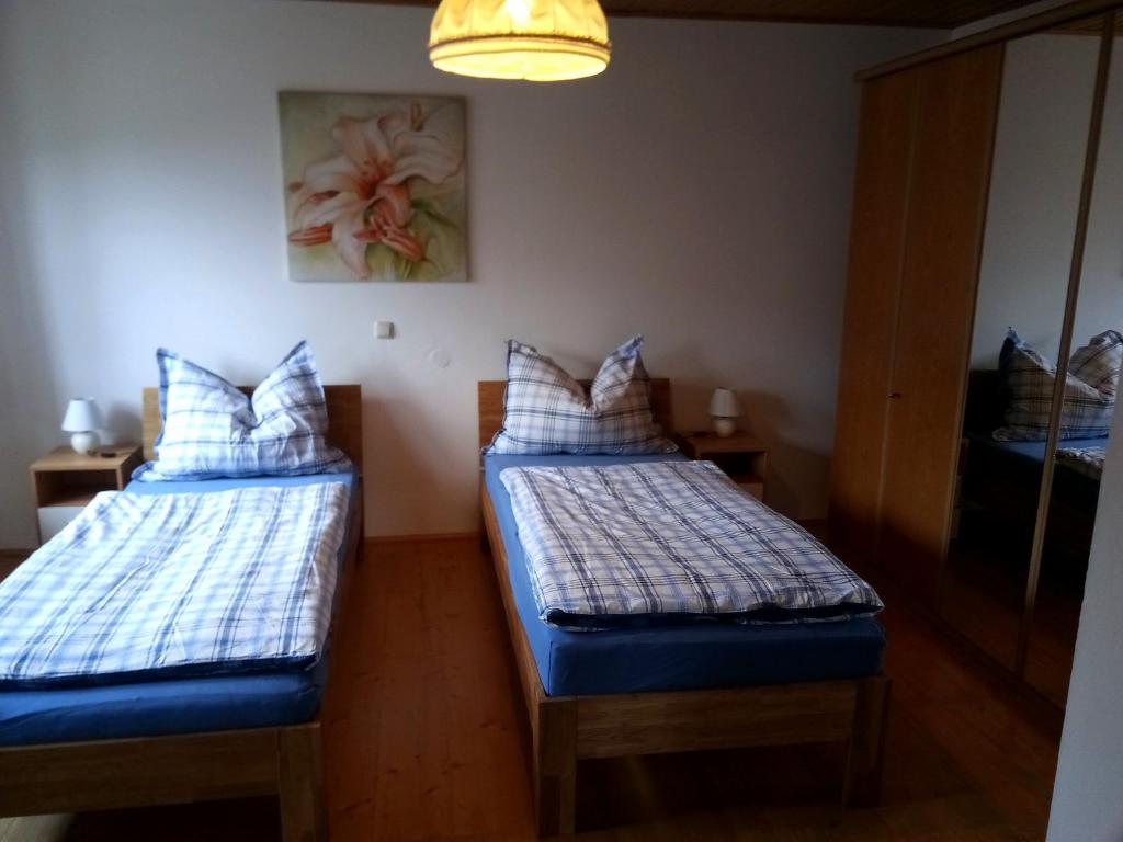 Postel nebo postele na pokoji v ubytování Leitingerhof