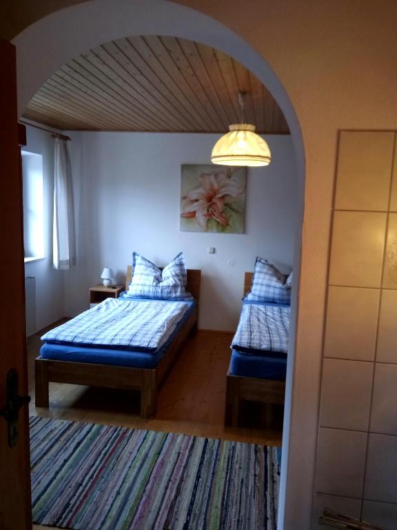 Postel nebo postele na pokoji v ubytování Leitingerhof
