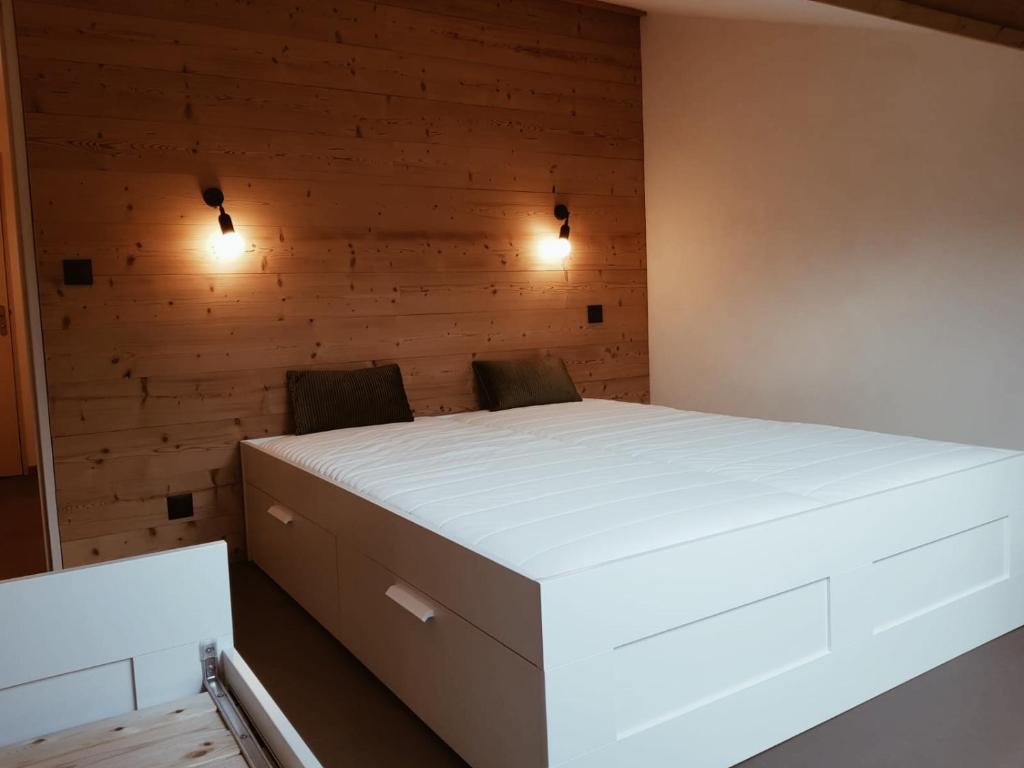 Postel nebo postele na pokoji v ubytování Les biches du Soula 5 couchages proche piste ski