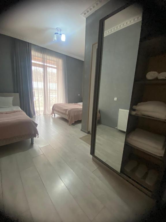 Postel nebo postele na pokoji v ubytování Hotel Elegant