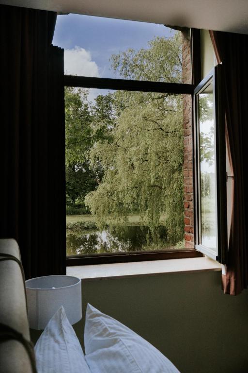 Postel nebo postele na pokoji v ubytování Château de Looz