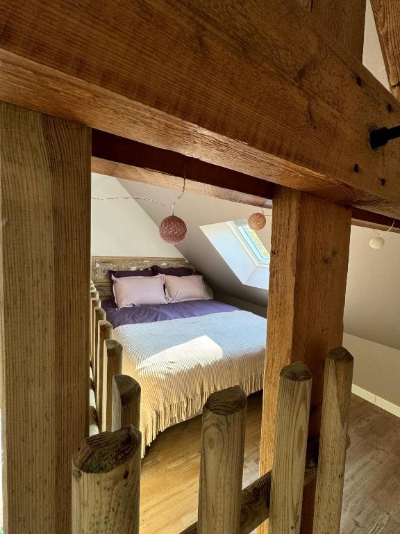 Postel nebo postele na pokoji v ubytování L'Escapade du marais