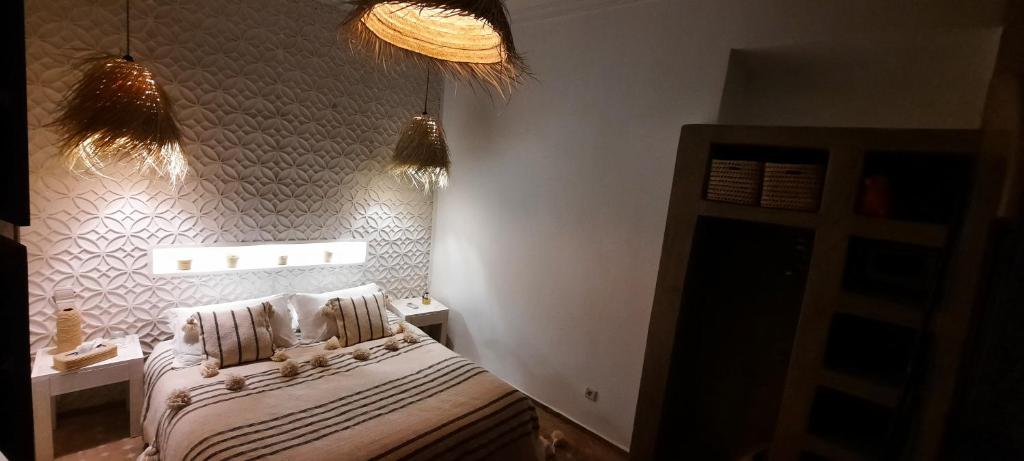 Postel nebo postele na pokoji v ubytování Riad Cosy