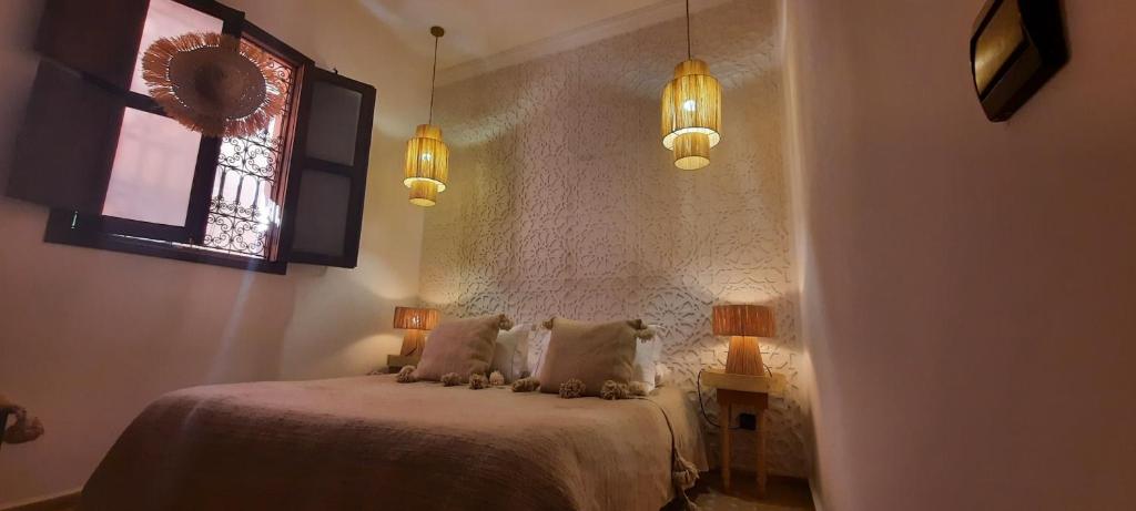 Postel nebo postele na pokoji v ubytování Riad Cosy