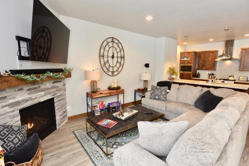 a living room with a couch and a fireplace at Silverpine Gem - Downtown - Walk to shops, restaurants, Payette Lake - WiFi in McCall