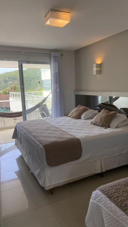 Cama ou camas em um quarto em Reserva Praia Hotel