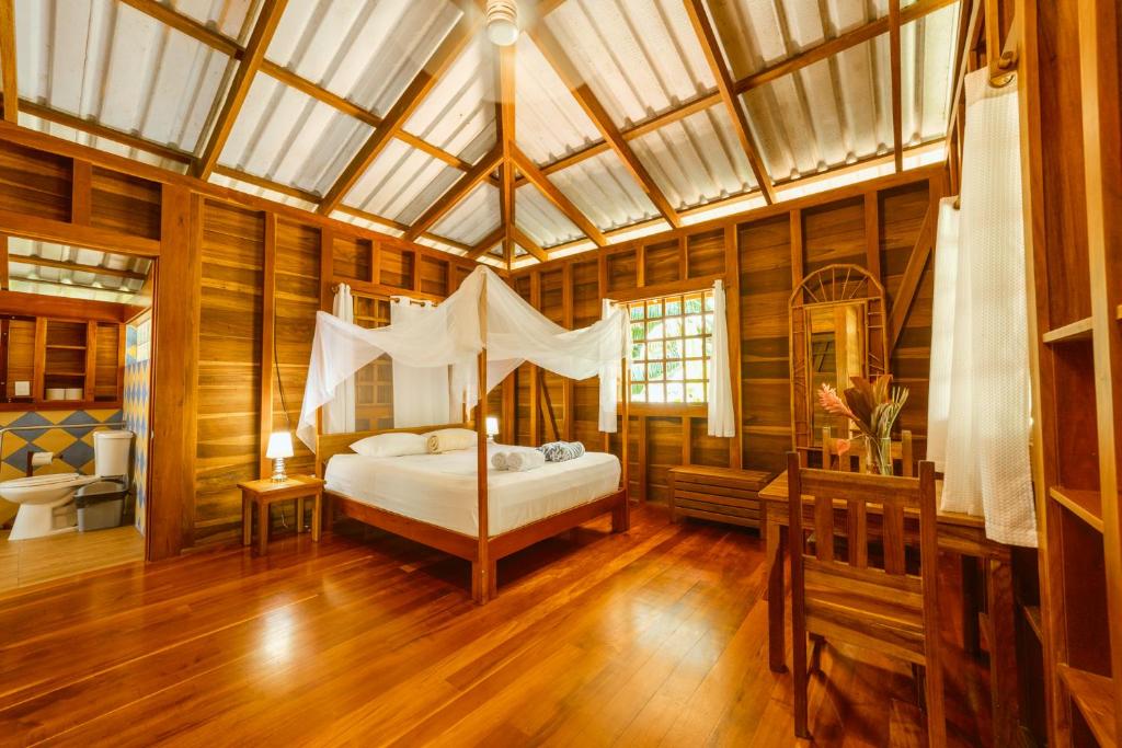 Postel nebo postele na pokoji v ubytování Casa Viva Lodge