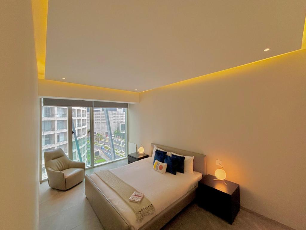 Cama ou camas em um quarto em Park Life Paradox Santa Fe