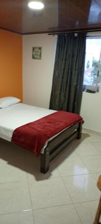 Postel nebo postele na pokoji v ubytování Casa Maral Hostal