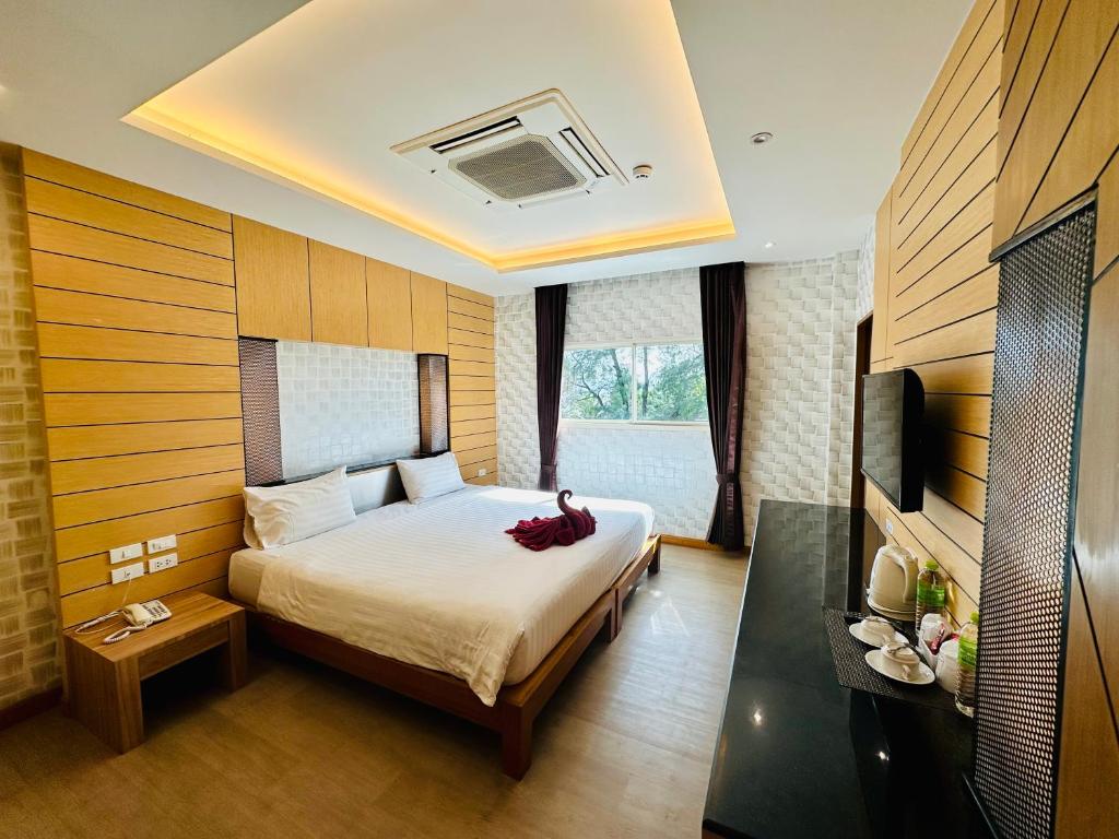 Postel nebo postele na pokoji v ubytování Anda Beachside Hotel