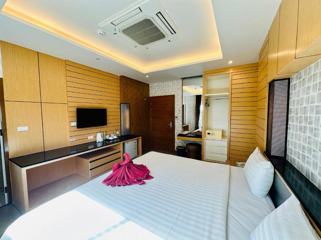 TV a/nebo společenská místnost v ubytování Anda Beachside Hotel