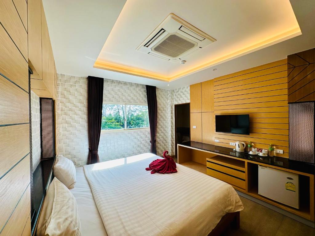 Postel nebo postele na pokoji v ubytování Anda Beachside Hotel