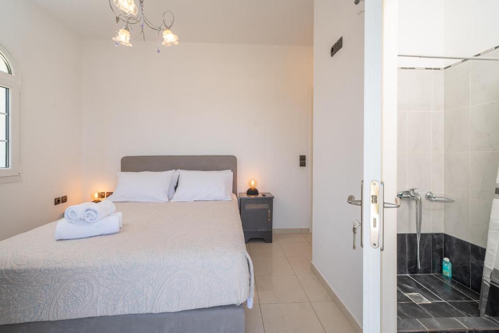Postel nebo postele na pokoji v ubytování Blue Villa