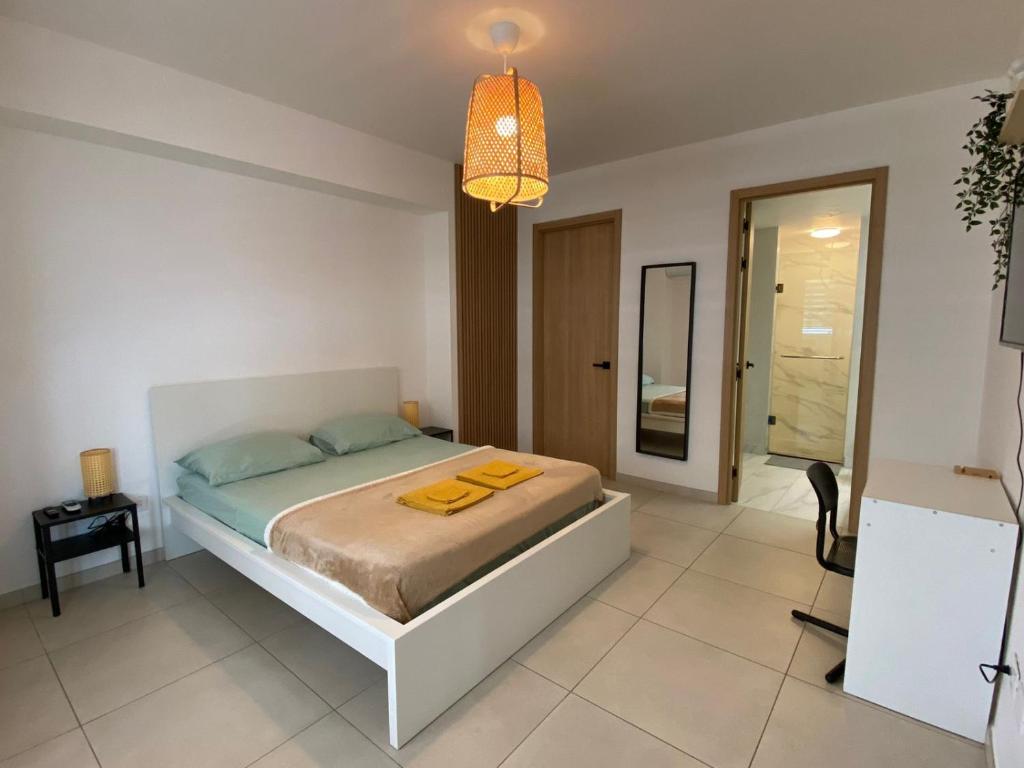 Postel nebo postele na pokoji v ubytování Acogedor Apartamento Céntrico