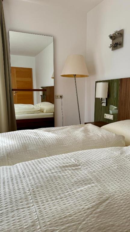 Postel nebo postele na pokoji v ubytování Apartment Römerhaus